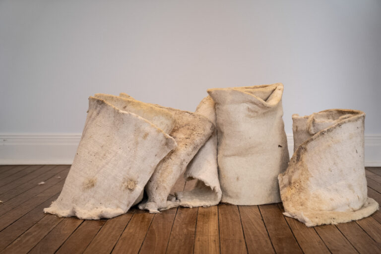 felt collapsing onto gallery floor